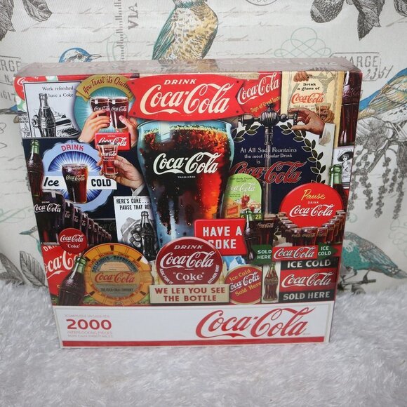 Coca Cola 2000 piece puzzle new and still sealed Decades of Tradition 34x42.5